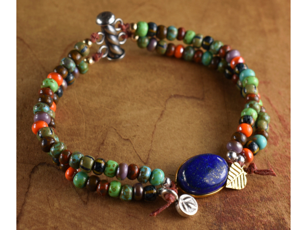 Colorful two strand beaded bracelet with Sterling silver and gold.