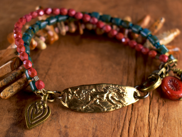 Multi-Strand Horse Bracelet Czech glass and jasper beaded bracelet with bronze focal by Gloria Ewing.