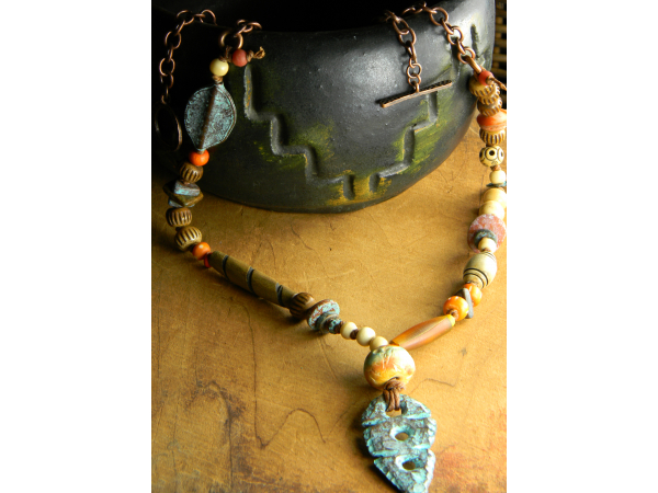 Tribal necklace with bone and horn by Gloria Ewing.