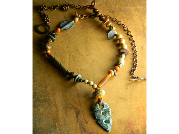 Primitive knotted necklace by Gloria Ewing.