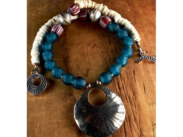 Handmade bronze pendant with African beads from Gloria Ewing.