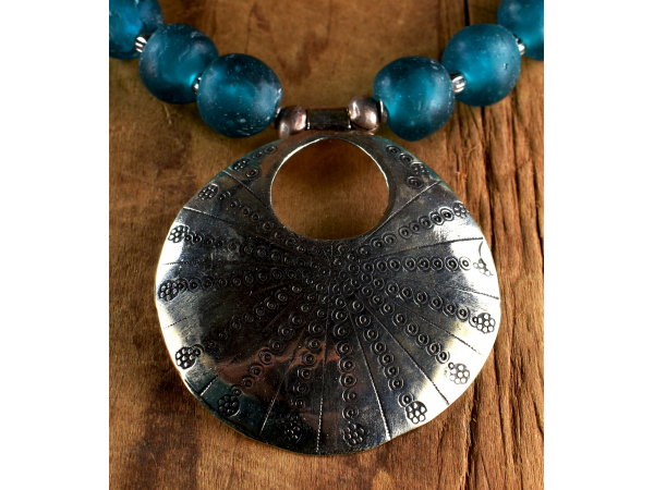Hand crafted African bronze tribal pendant necklace.
