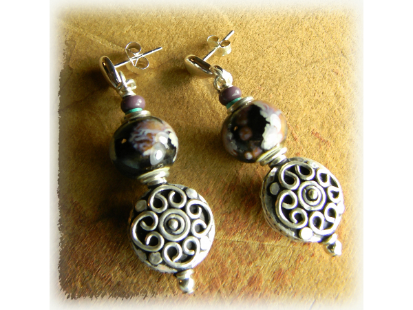 Black ceramic beaded earrings with Sterling silver by Gloria Ewing.