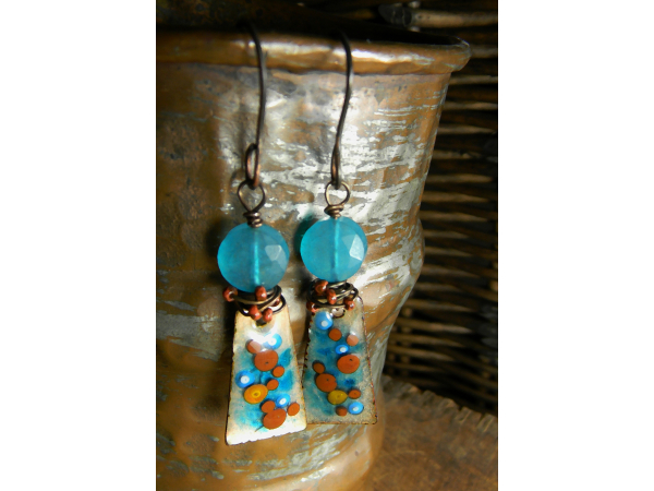 Blue jade coin beads with brilliant blue copper enamel in a wire wrapped earring