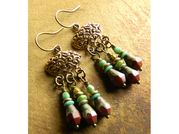 Dark red and blue with bronze in beaded earrings by Gloria Ewing.