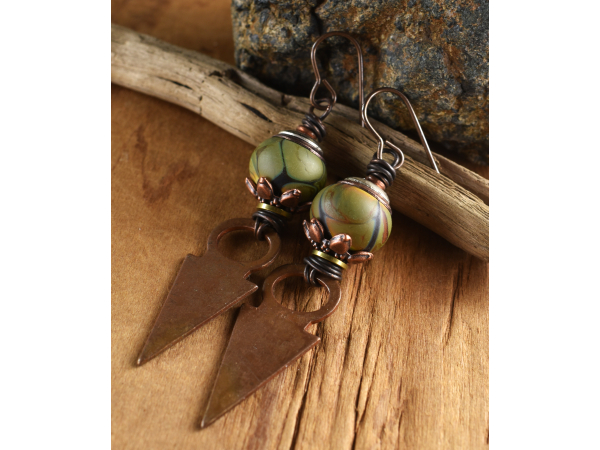 Jungle pattern lampwork glass with copper by Gloria Ewing.