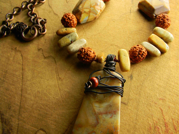 Earth tone beaded necklace by Gloria Ewing.