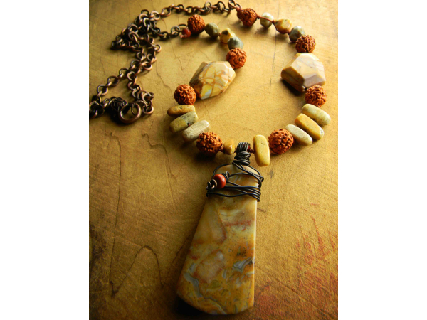 Earth tone beaded necklace by Gloria Ewing.