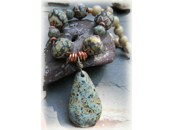 Smokey blue lampwork beads in a southwestern necklace.