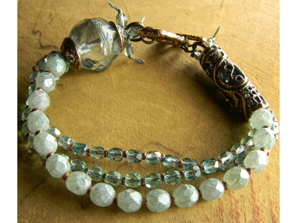 Copper and green beaded bracelet by Gloria Ewing.