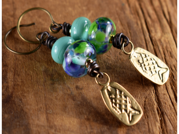 Artisan bronze and lampwork glass earrings from Gloria Ewing.