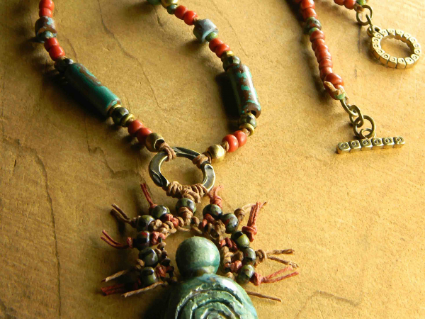 Artisan ceramic goddess beaded necklace by Gloria Ewing.