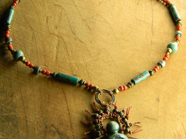 Tribal trade bead necklace with brass by Gloria Ewing.