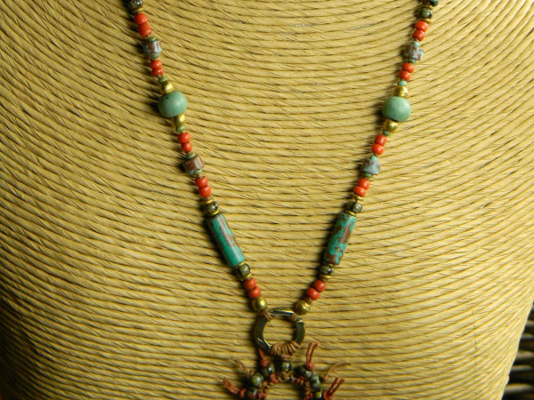 Colorful beaded pendant necklace by Gloria Ewing.