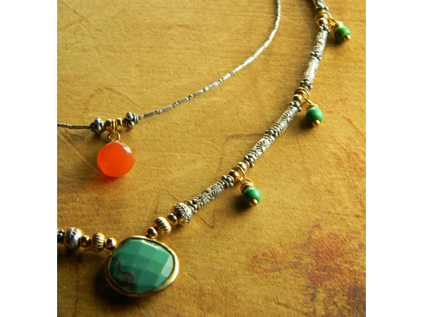 Lovely contrast of turquoise and orange beaded design.