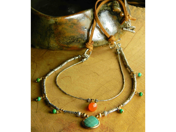 Green turquoise and carnelian in a multi-strand design.