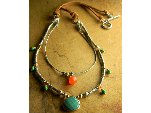Silver, gemstones and gold accents in this beautiful creation by Gloria Ewing.