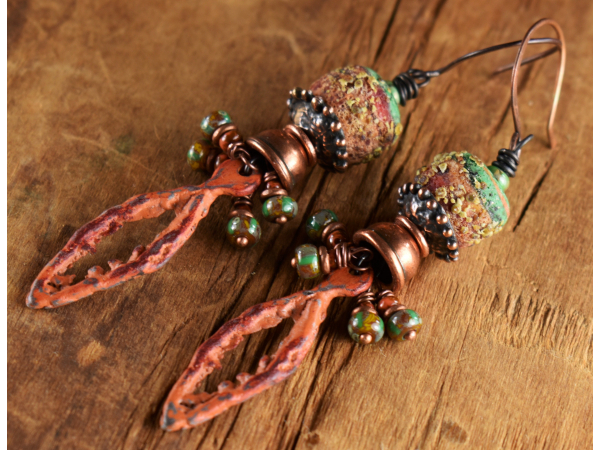 Handmade glass and patina pewter earrings from Gloria Ewing.