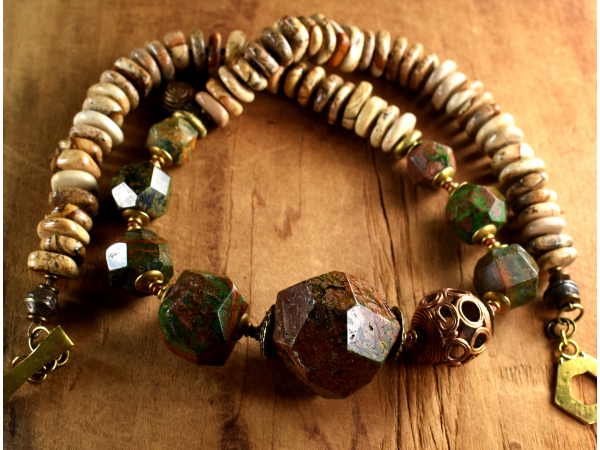 Mix of tribal brass and jasper beads in a long necklace by Gloria Ewing.