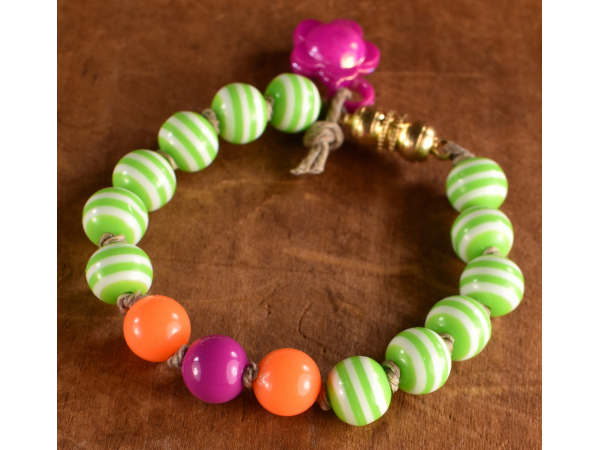 Brightly colored acrylic beaded child's bracelet by Gloria Ewing.