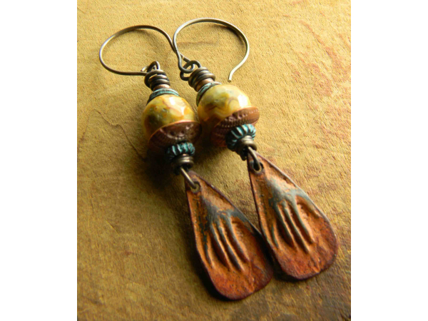Faceted agate with rustic charms in earrings by Gloria Ewing.