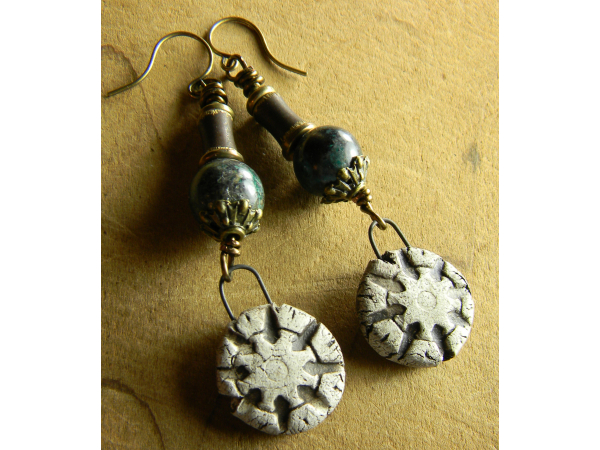 Rustic brass with artisan ceramic drops and chrysocolla.