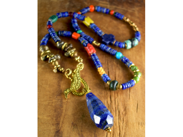 Long pendant necklace with colorful lapis and coral from Gloria Ewing.