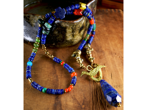 Beaded lapis lazuli with teardrop pendant by Gloria Ewing.