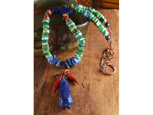 Tribal beaded pendant necklace in colorful stones by Gloria Ewing.