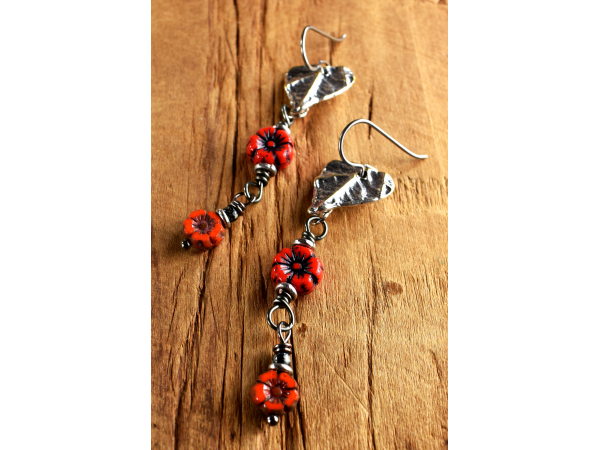 Long red flower themed dangle earrings from Gloria Ewing.