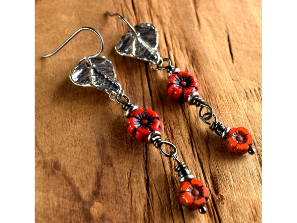 Pewter and red flower dangle earrings from Gloria Ewing.
