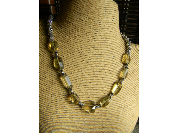 Chunky lemon quartz faceted nuggets in this unusual choker by Gloria Ewing.