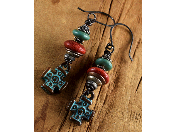 Verdigris patina cross drops with coral and turquoise from Gloria Ewing.