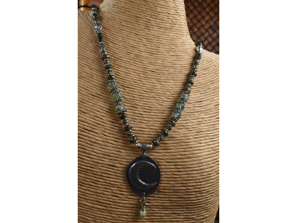 Shaded of blue and green in a Boho design from Gloria Ewing.