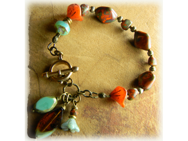 Rustic orange and aqua beaded bracelet design by Gloria Ewing.