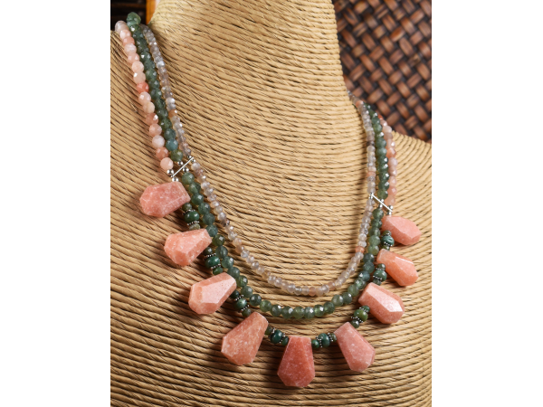 Calcite, moonstone and green apatite in this piece from Gloria Ewing.