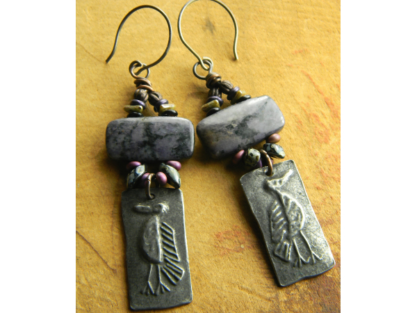 Purple dormutierite earrings by Gloria Ewing.