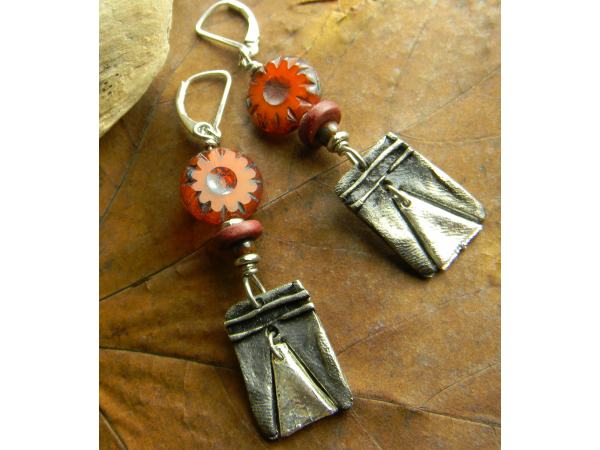 Bohemian pewter charms with orange flowers by Gloria Ewing.