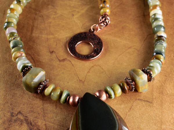 Marquise polychrome pendant with cat's eye by Gloria Ewing.