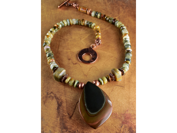 Marquise polychrome pendant with cat's eye by Gloria Ewing.