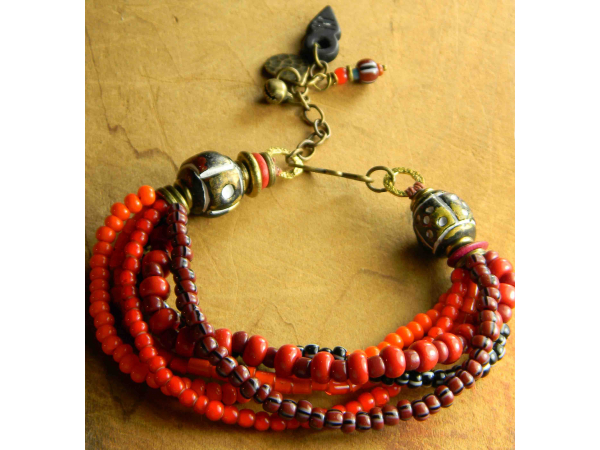 Shades of red in a trade bead bracelet by Gloria Ewing.