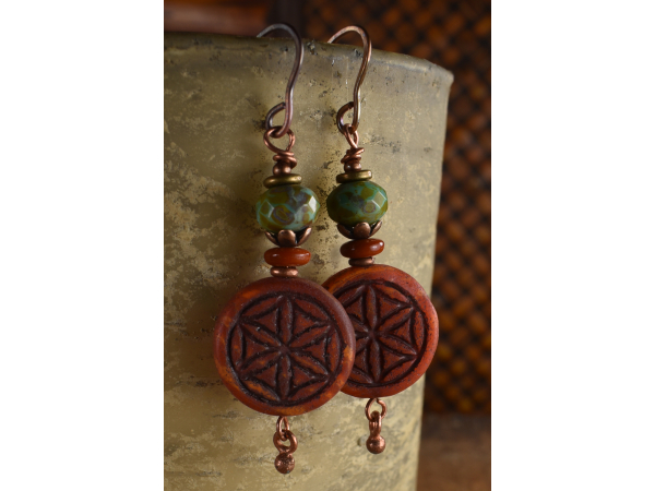 Rust clay and subtle blue with copper in earrings by Gloria Ewing.