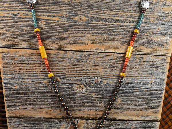 Colors of the southwest in a long beaded necklace by Gloria Ewing.