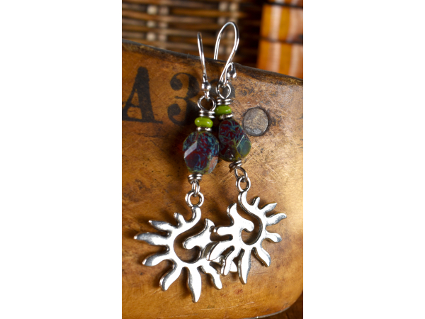 Pewter spiral sun charms with Czech glass by Gloria Ewing.