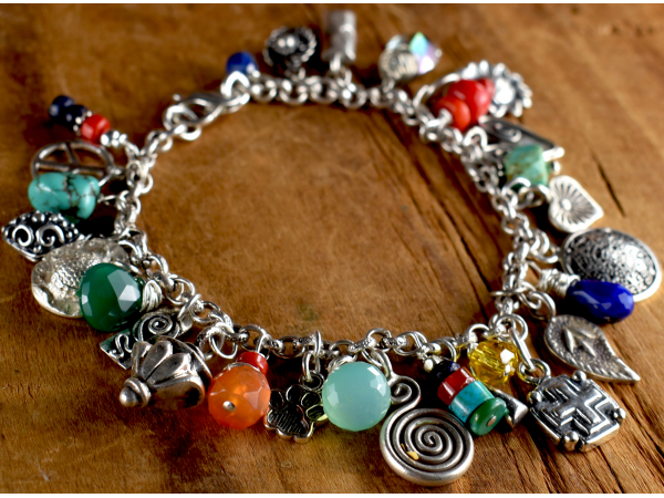 Colorful gemstones and charms, design by Gloria Ewing.