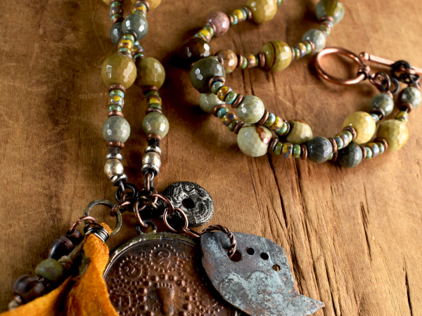 Jasper beads with a copper Buddha pendant by Gloria Ewing.