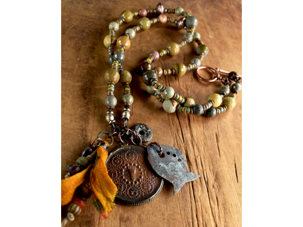 Jasper beads with a copper Buddha pendant by Gloria Ewing.