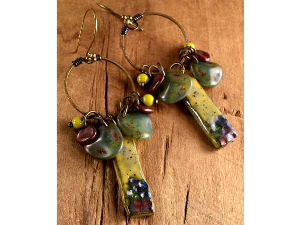 Soft colors in a Boho style beaded hoop by Gloria Ewing.