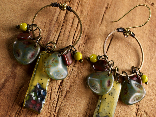 Lovely beaded chandelier with artisan ceramic from Gloria Ewing.