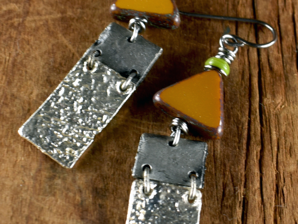 Play on shapes with geometric beaded earrings from Gloria Ewing.